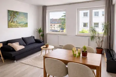 Ein Sitzbereich in der Unterkunft Top modernes Apartment direkt an Messe, Cali