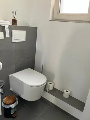 Ein Badezimmer in der Unterkunft Top modernes Apartment direkt an Messe, Cali