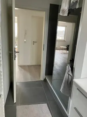 Ein Bett oder Betten in einem Zimmer der Unterkunft Top modernes Apartment direkt an Messe, Cali