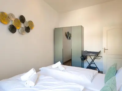 Ein Bett oder Betten in einem Zimmer der Unterkunft Wuppertal nähe DUS, 2 Bedrooms, Parking