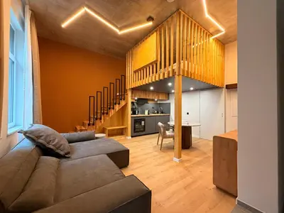 Ein Sitzbereich in der Unterkunft Villa Weitmar - Design Loft mit Private Spa