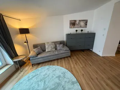 Ein Sitzbereich in der Unterkunft NEU - APARTMENT FOR 6 IN HAGEN- DIRECT PARKING! A45 - A1 - A46 Richtung Dortmund Netflix - WIFI, Fully-Automatic-COFFEMASHINE, KITCHEN, NETFLIX, DISNEY