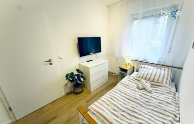 Ein Bett oder Betten in einem Zimmer der Unterkunft BEGE APARTMENTS InspireSpace