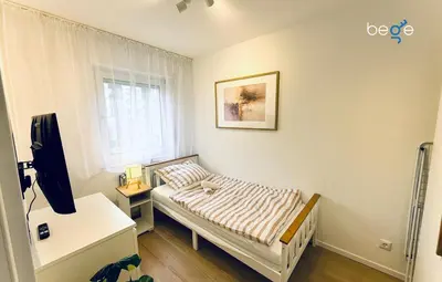 Ein Bett oder Betten in einem Zimmer der Unterkunft BEGE APARTMENTS InspireSpace