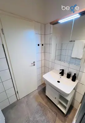 Ein Badezimmer in der Unterkunft BEGE APARTMENTS InspireSpace