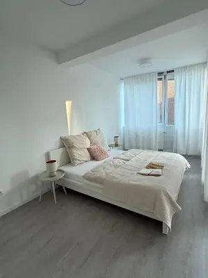 Ein Bett oder Betten in einem Zimmer der Unterkunft Loft-like Apartment 150 sqm near Veltins Arena