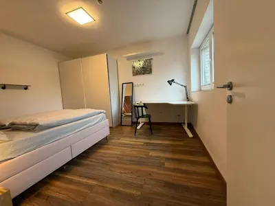 Ein Bett oder Betten in einem Zimmer der Unterkunft House Regatta