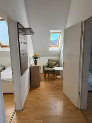 Ein Bett oder Betten in einem Zimmer der Unterkunft Helle Dachgeschoßwohnung am Laurentiusplatz