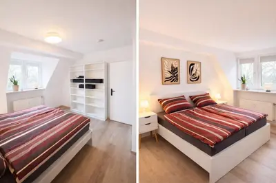 Ein Bett oder Betten in einem Zimmer der Unterkunft Seeblick Apartment Duisburg am Blauen See - 15 Min zur Messe Düsseldorf