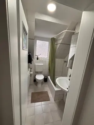 Ein Badezimmer in der Unterkunft Seeblick Apartment Duisburg am Blauen See - 15 Min zur Messe Düsseldorf