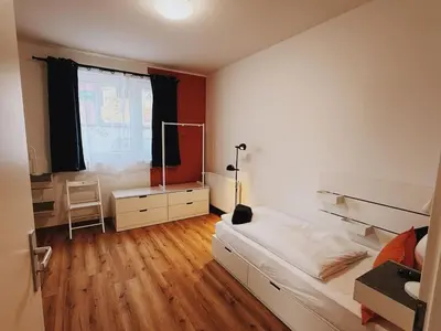 Ein Bett oder Betten in einem Zimmer der Unterkunft Case 3 BR 6 P Parking & Privat-Entry