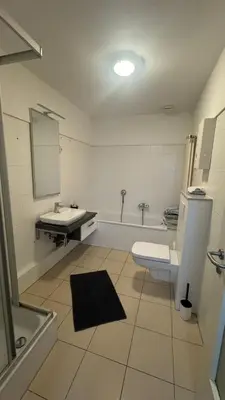 Ein Badezimmer in der Unterkunft Zum Postwagen Apartments