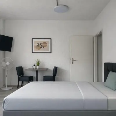 Ein Bett oder Betten in einem Zimmer der Unterkunft Zum Postwagen Apartments