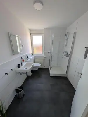 Ein Badezimmer in der Unterkunft Ferienwohnung Gästehaus Bauer 1