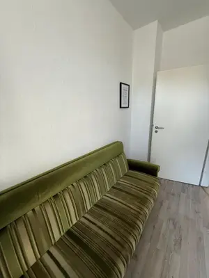 Ein Sitzbereich in der Unterkunft Ferienwohnung Essen Frohnhausen 2