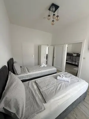 Ein Bett oder Betten in einem Zimmer der Unterkunft Ferienwohnung Essen Frohnhausen 2