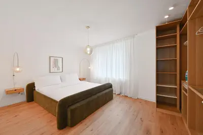 Ein Bett oder Betten in einem Zimmer der Unterkunft Beautiful 2-Room Apartment in City Center with Kitchen and Free Wifi