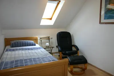 Ein Bett oder Betten in einem Zimmer der Unterkunft Alter Bahnhof