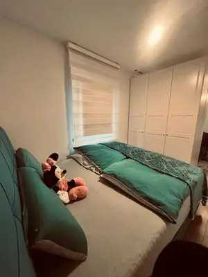 Ein Bett oder Betten in einem Zimmer der Unterkunft Apartment klein, fein, ruhig und gemütlich