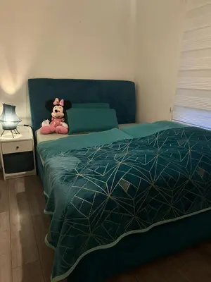 Ein Bett oder Betten in einem Zimmer der Unterkunft Apartment klein, fein, ruhig und gemütlich