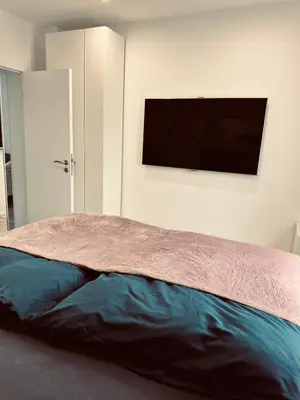 Ein Bett oder Betten in einem Zimmer der Unterkunft Wohnung gemütlich, ruhig ideal für Familien