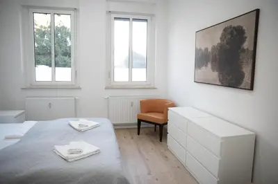 Ein Bett oder Betten in einem Zimmer der Unterkunft Design Apartment - Solingen-Mitte - Balkon