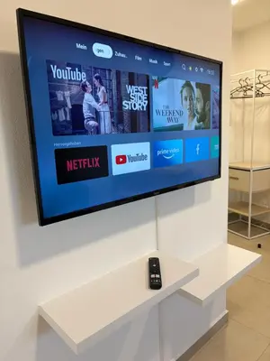 TV/Unterhaltungsangebot in der Unterkunft Modernes Apartment mit Smart-TV & WLAN nahe Messe