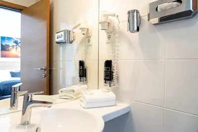 Ein Badezimmer in der Unterkunft LivInn by Trotmannia