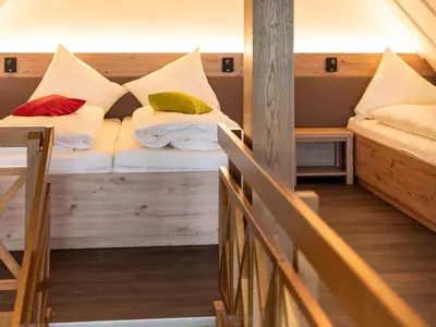 Ein Bett oder Betten in einem Zimmer der Unterkunft Gasthof Spelsberg