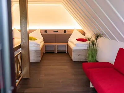 Ein Bett oder Betten in einem Zimmer der Unterkunft Gasthof Spelsberg
