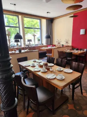Ein Restaurant oder anderes Speiselokal in der Unterkunft Hotel Hoppe