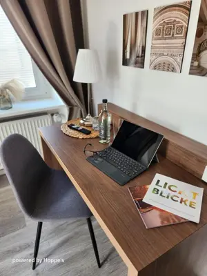 Ein Sitzbereich in der Unterkunft Hotel Hoppe