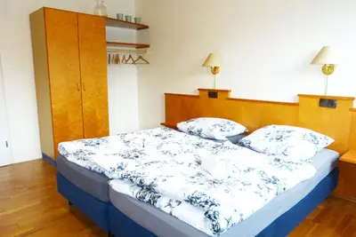 Ein Bett oder Betten in einem Zimmer der Unterkunft Messe-Zimmer TuS-Treff