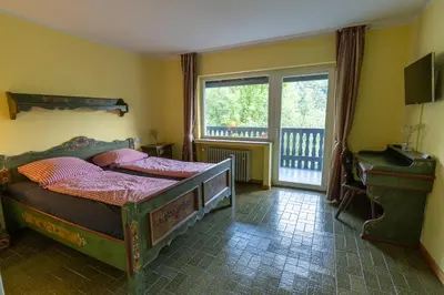 Ein Bett oder Betten in einem Zimmer der Unterkunft Hotel in der Strassen