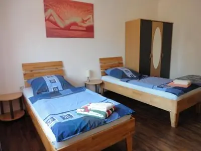 Ein Bett oder Betten in einem Zimmer der Unterkunft Ferienwohnung Laux