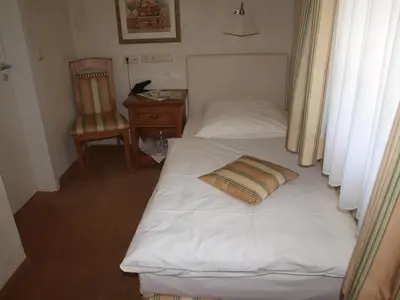 Ein Bett oder Betten in einem Zimmer der Unterkunft Wegermann`s BIO-Landhaus im Wodantal