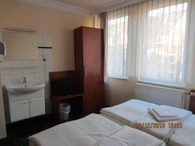 Ein Bett oder Betten in einem Zimmer der Unterkunft Altstadt Hotel Rheinblick