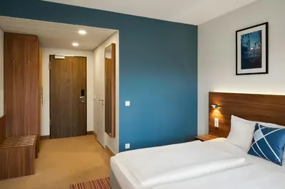 Ein Bett oder Betten in einem Zimmer der Unterkunft Four Points Flex by Sheraton Essen