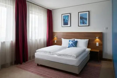 Ein Bett oder Betten in einem Zimmer der Unterkunft Four Points Flex by Sheraton Essen