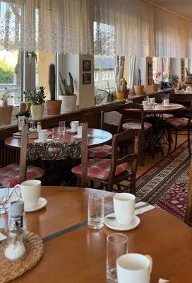 Ein Restaurant oder anderes Speiselokal in der Unterkunft Hotel Lintforter Hof