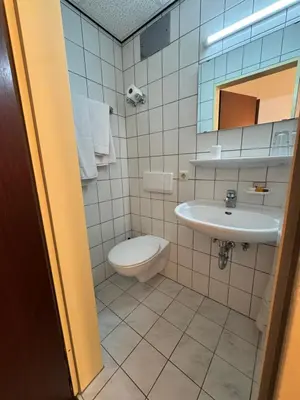 Ein Badezimmer in der Unterkunft Hotel Lintforter Hof
