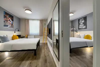 Ein Bett oder Betten in einem Zimmer der Unterkunft SleepinRoomz Boutique Hotel Dortmund-West