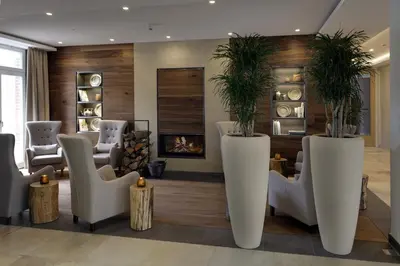 Ein Sitzbereich in der Unterkunft Hofhotel Grothues-Potthoff