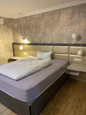 Ein Bett oder Betten in einem Zimmer der Unterkunft Das kleine Landhotel