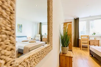 Ein Bett oder Betten in einem Zimmer der Unterkunft Hotel Gut Moschenhof