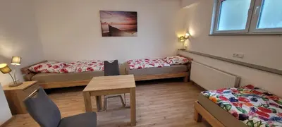 Ein Bett oder Betten in einem Zimmer der Unterkunft Wohnung in Datteln