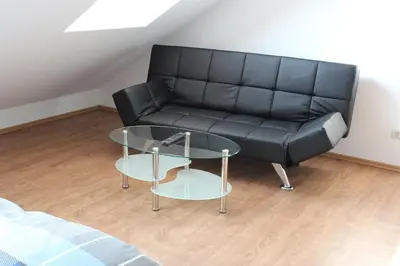 Ein Sitzbereich in der Unterkunft Ferienwohnung