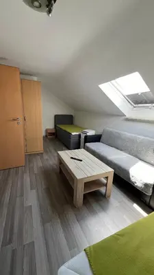 Ein Bett oder Betten in einem Zimmer der Unterkunft Ferienwohnung