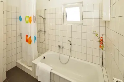 Ein Badezimmer in der Unterkunft Petul Apart Hotel Residenz