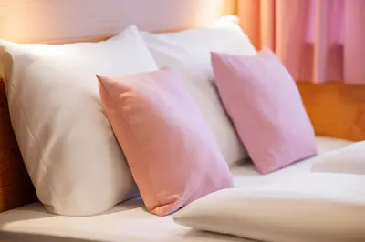 Ein Bett oder Betten in einem Zimmer der Unterkunft McDreams Hotel Wuppertal City